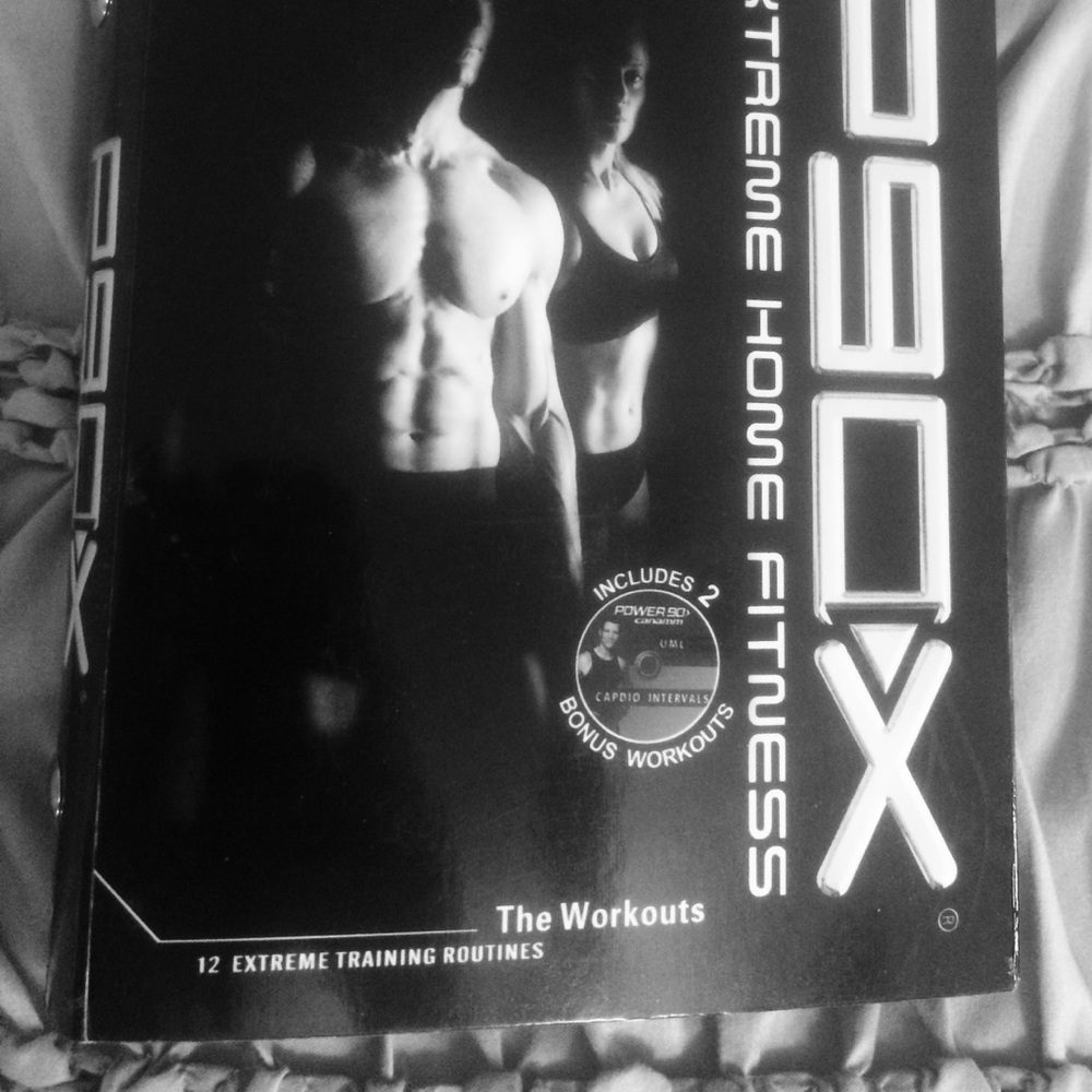 P90X! 12 DVD discs and fitness guide